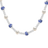 Necklace with pearls and blue and white porcelain beads on a white background