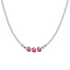 Necklace with three pink porcelain beads on a white background