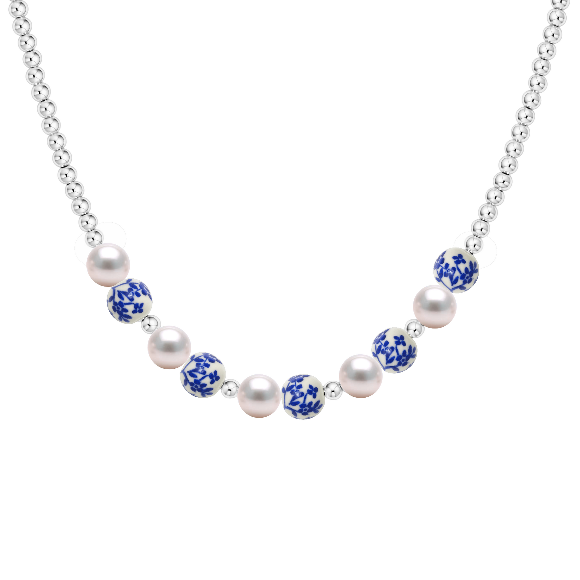 Necklace with pearls and blue porcelain beads on a white background
