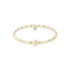 Pearl and gold beaded bracelet on a white background