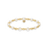 Pearl and gold beaded bracelet on a white background