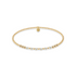 Gold and pearl beaded bracelet on a white background