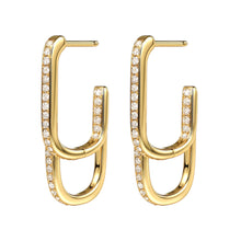 Gold hoop earrings with diamond accents on a white background