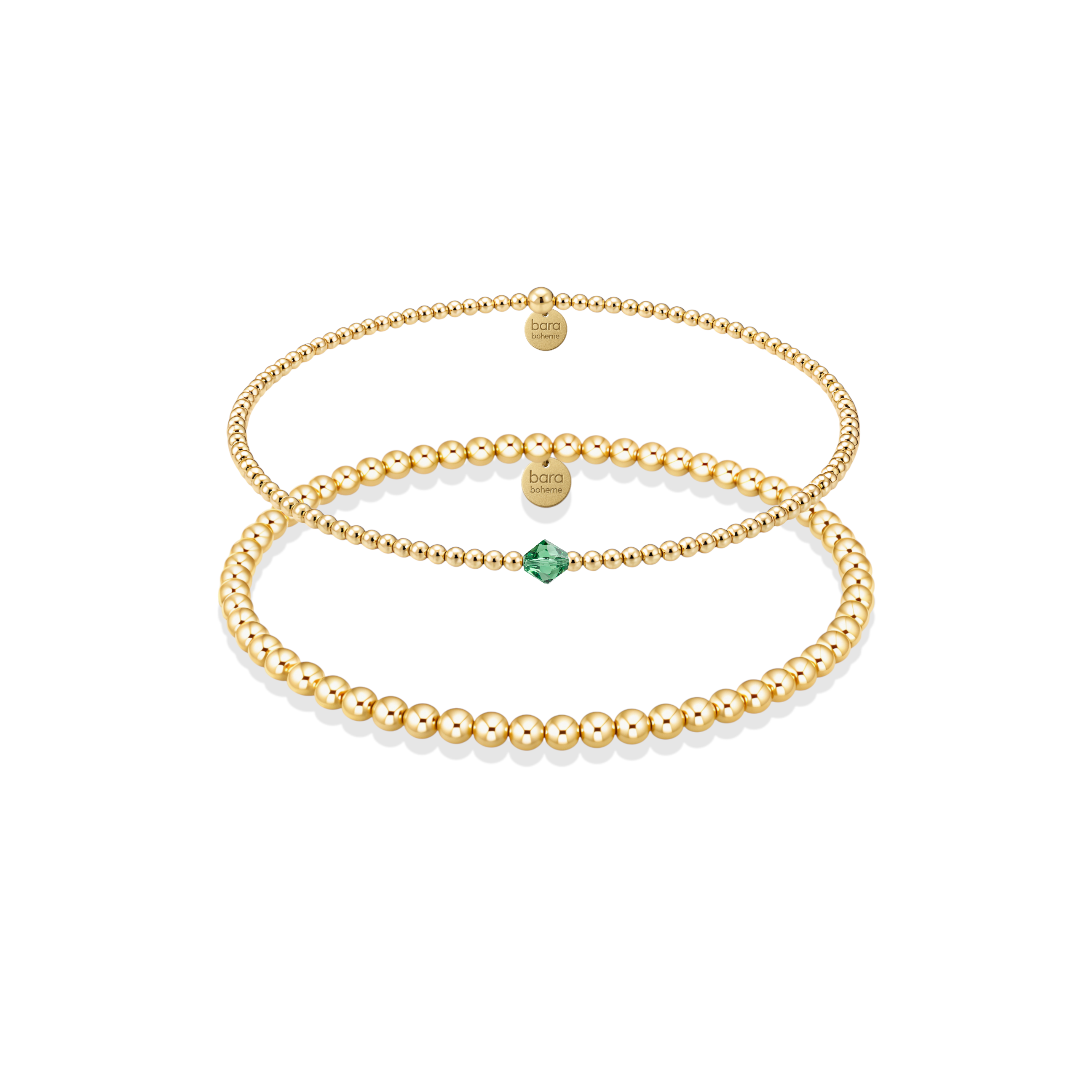 Gold beaded bracelet with a green gemstone on a white background