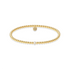 Gold beaded bracelet with a pearl on a white background
