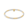 Bracelet with silver and gold beads on a white background
