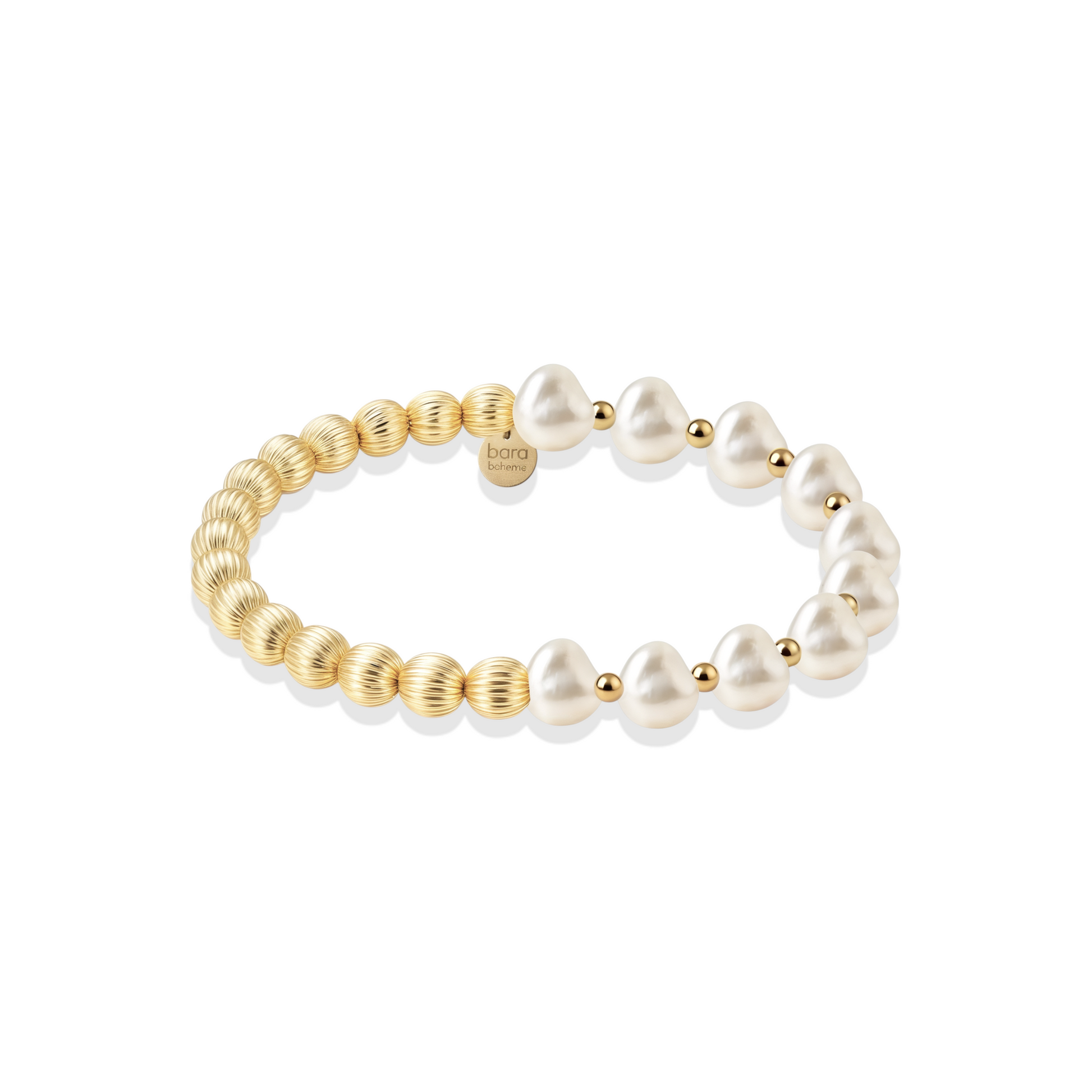 Gold and pearl beaded bracelet on a white background