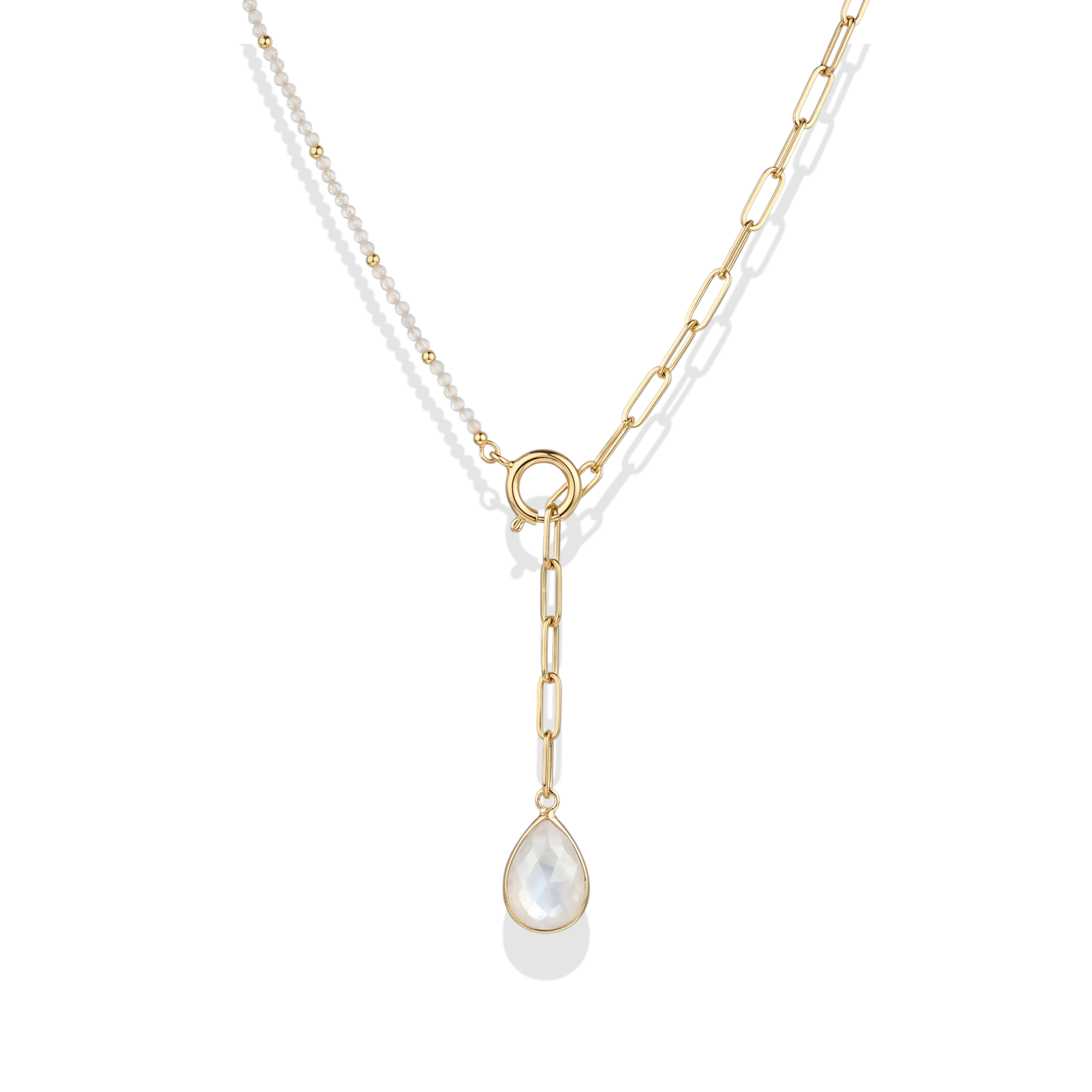Gold necklace with a teardrop-shaped pearl pendant on a white background