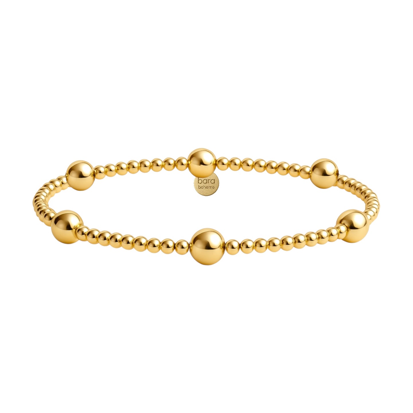 Gold beaded bracelet on a white background