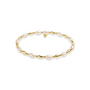 gold and pearl beaded bracelet on a white background