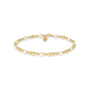 Gold and pearl beaded bracelet on a white background