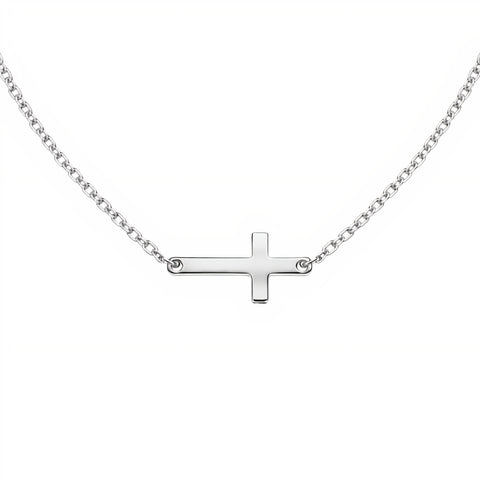 Silver cross necklace on a white background