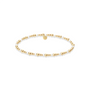 Gold beaded bracelet on a white background