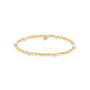 Gold beaded bracelet with pearls on a white background