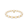 Pearl beaded bracelet with gold accents on a white background