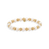 Pearl and gold beaded bracelet on a white background