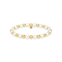 Pearl and gold bead bracelet on a white background
