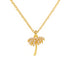 Gold palm tree necklace on a white background