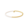 pearl and gold beaded bracelets on a white background