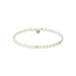Pearl beaded bracelet with gold accents on a white background