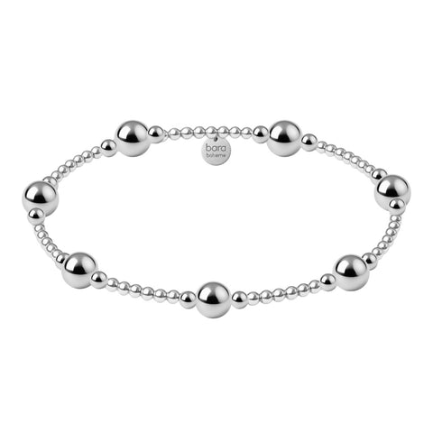 Silver beaded bracelet on a white background
