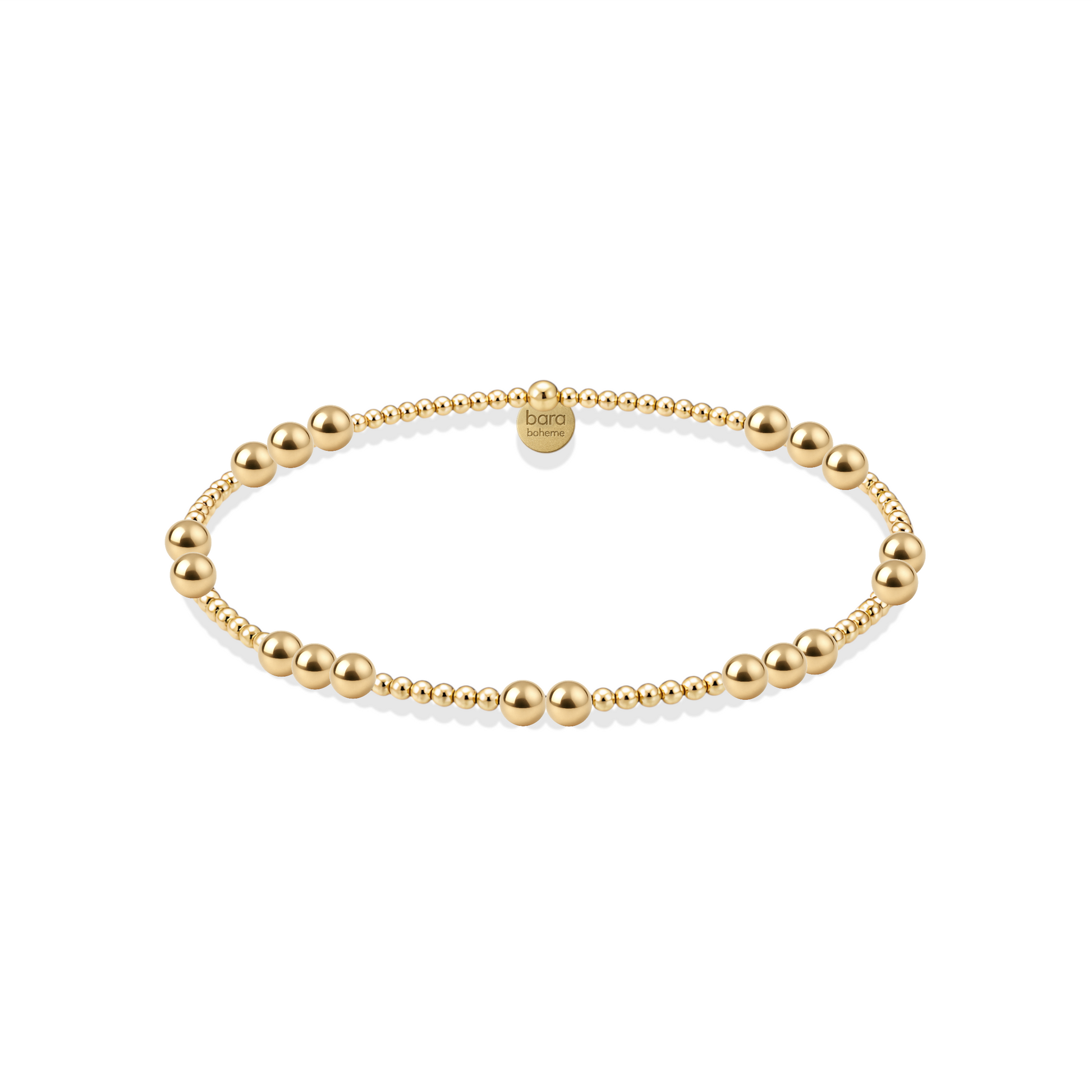 Gold beaded bracelet on a white background