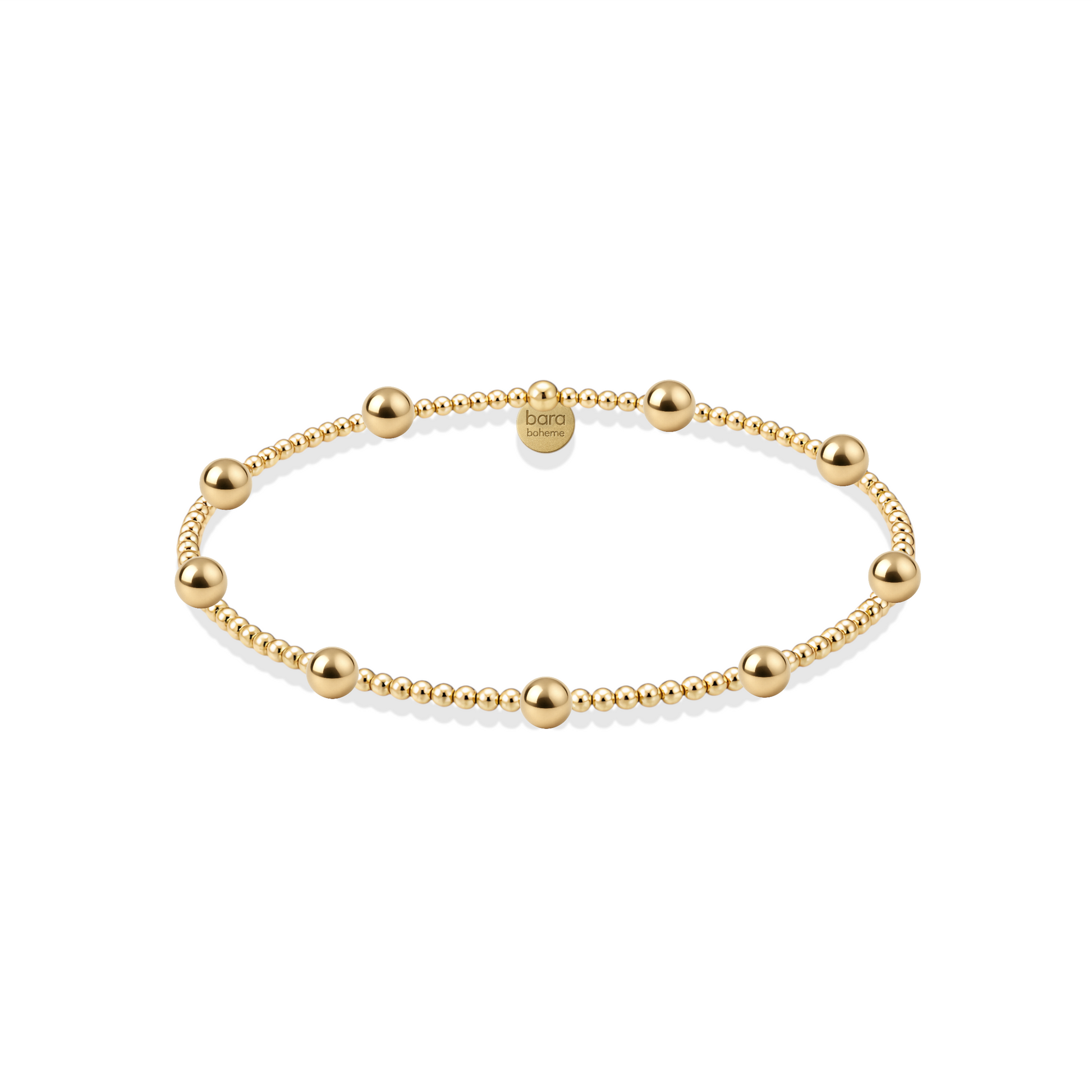 Gold beaded bracelet on a white background