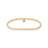 Gold beaded bracelet with a bar design on a white background