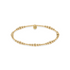 Gold beaded bracelet on a white background