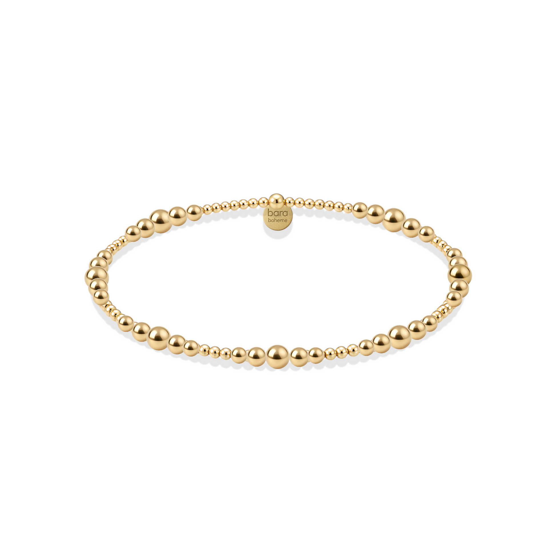 Gold beaded bracelet on a white background