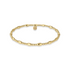 Gold beaded bracelet on a white background