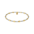 Two-tone gold and silver beaded bracelet on a white background