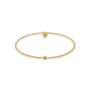 Gold beaded bracelet on a white background