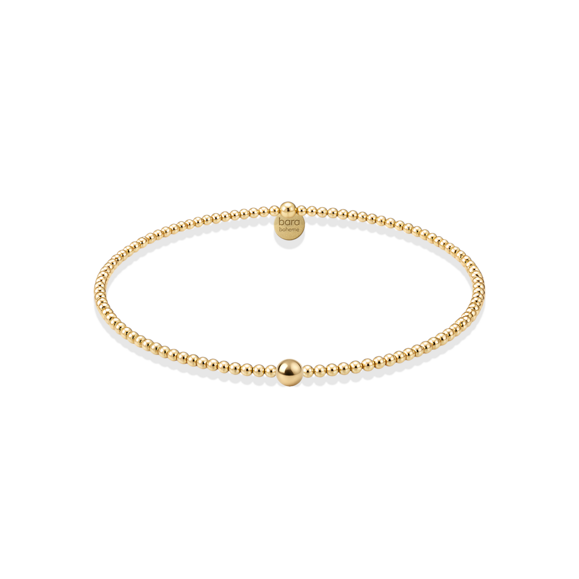 Gold beaded bracelet on a white background