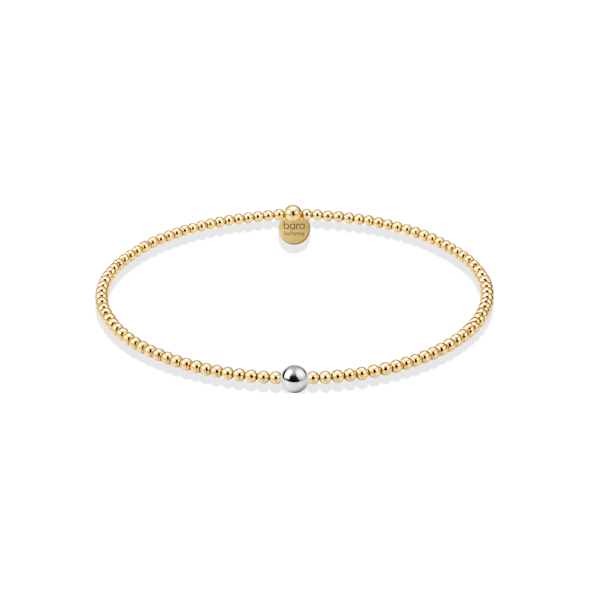 Gold beaded bracelet with a silver bead on a white background