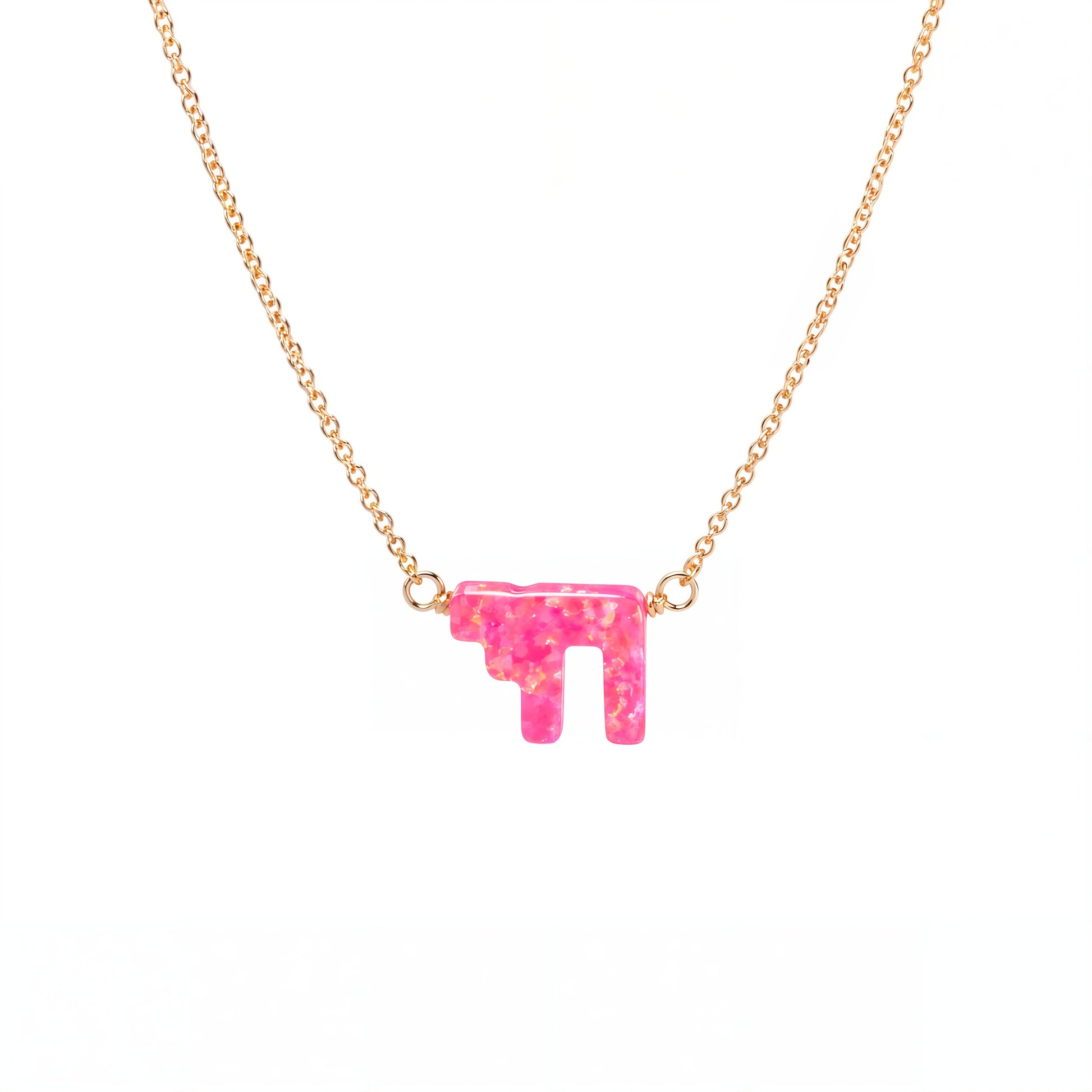 Necklace with a pink pendant on a white background